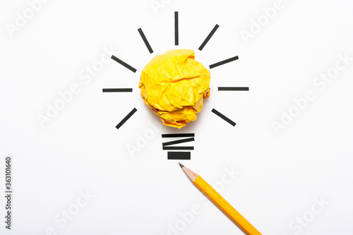 Inspiration concept crumpled color paper light bulb metaphor for good idea
