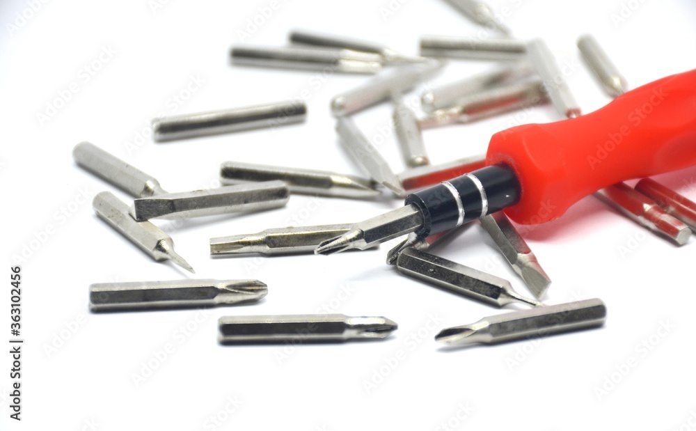 Set of heads for screwdriver (bits) isolated on a white background. Set of heads for screwdriver (bits) isolated on a white background.