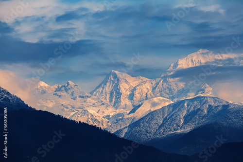 Kangchenjunga close up view from Pelling in Sikkim, India. Kangchenjunga is the third highest mountain in the world. photo