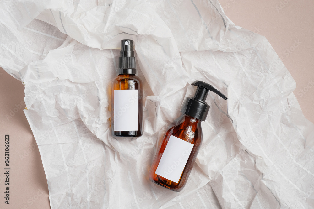 SPA natural organic cosmetics packaging in wrapping paper. Amber glass ...