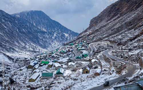 Snowy white peaks of Nathula Pass at Sikkim, India photo