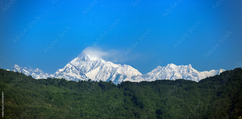 Snowy white peaks of Nathula Pass at Sikkim, India