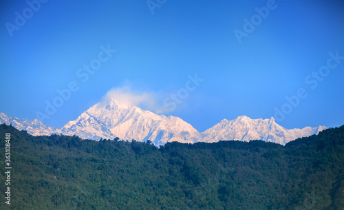 Snowy white peaks of Nathula Pass at Sikkim  India