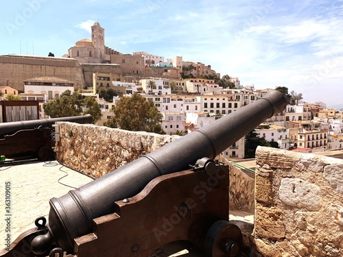 Cannon Against Buildings In City
