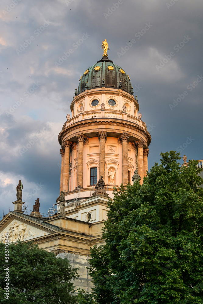 View of famous Gendarmenmarkt square at sunset in Berlin, Germany