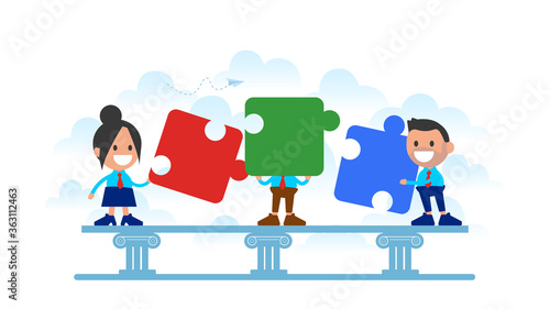 Team connecting puzzle elements. Symbol of teamwork, partnership, cooperation.
