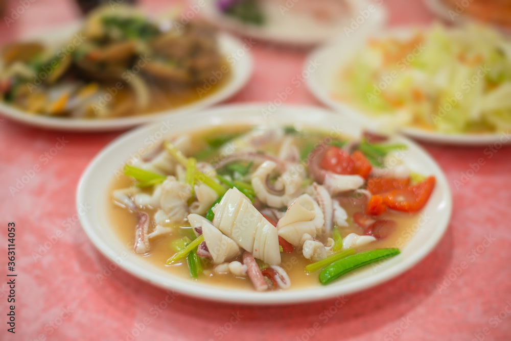 chinese pan fried squide with sweet pepper chinese pan fried squide with sweet pepper