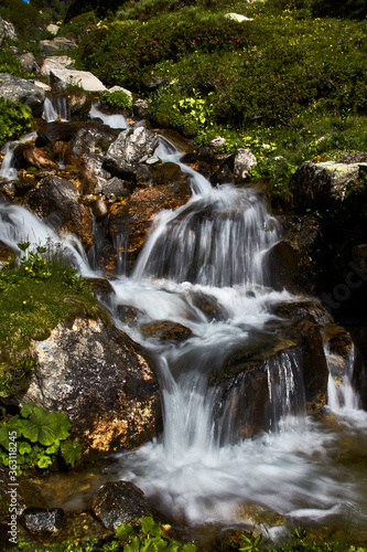 Fototapeta Naklejka Na Ścianę i Meble -  Waterfalls on a river in the forest