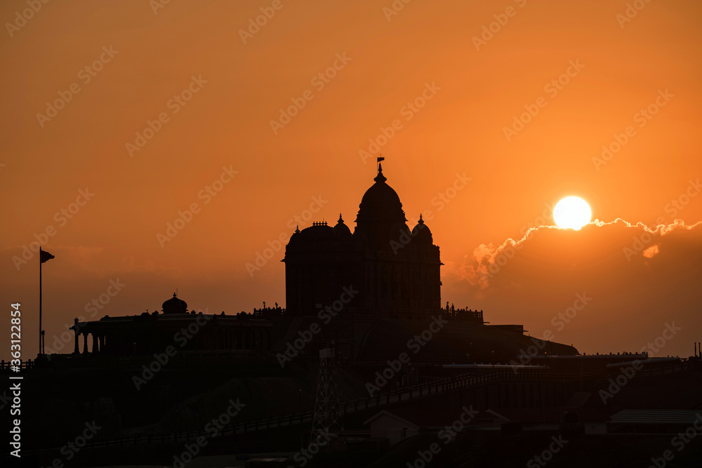 Fototapeta premium Sunrise view of Swami Vivekananda Memorial rock and thiruvalluvar island in Kanyakumari, India