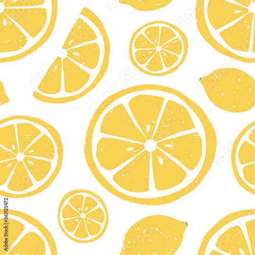 Cute lemon seamless pattern. Lemon and lemon slice on white background.  Can be used for wallpaper, fabric, wrapping paper or decoration. Vector hand drawn illustration