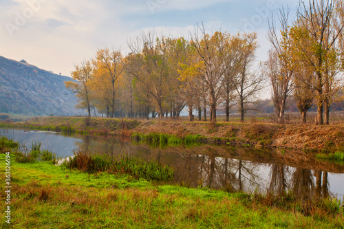 Sunrise over a misty small river