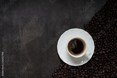 Cup of coffee and Coffee composition on black background. Copy space. Top view. Flat lay.