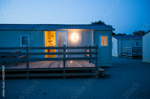Ribe, Denmark -21 aug 2015- White bungalows at dusk in a camping.