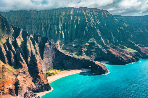 Napali coast on Kauai North shore island, Hawaii. Aerial view of famous landscape with beach, mountains and rugged ridges. photo