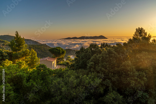 Sunrise views from the Montcabrer mountain in a day with clouds, Cocentaina. photo