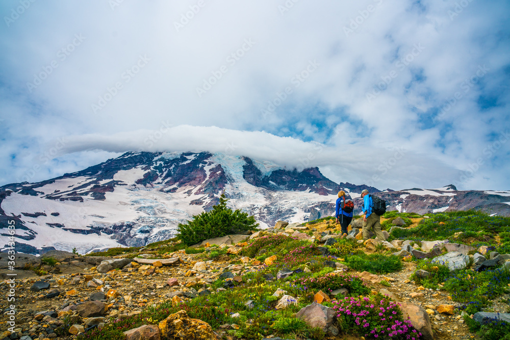 A cloud covered over the snow cap on Mount Rainier, in Washington.