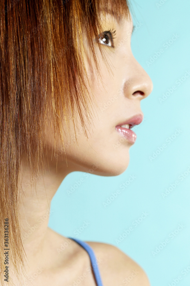 Fototapeta premium Side shot of a woman's face
