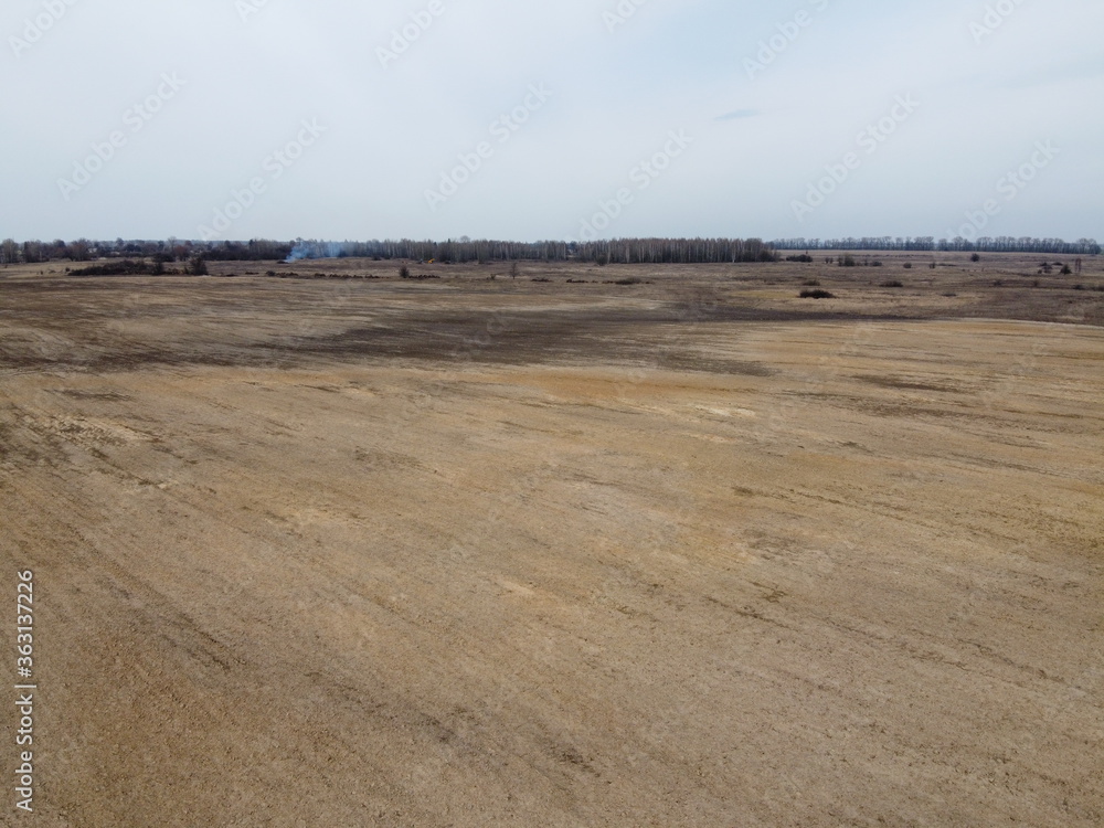 Agricultural land, aerial view. Landscape. Arable fields in the spring. Agricultural land, aerial view. Landscape. Arable fields in the spring.
