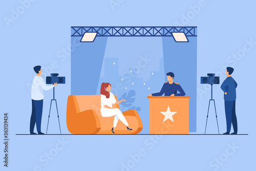 TV host interviewing celebrity person in studio. Camera crew working on talk show. Vector illustration for videographer job, broadcasting, news concept