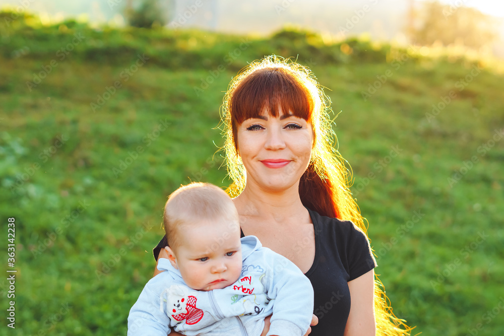 mother with a baby in her arms mother with a baby in her arms