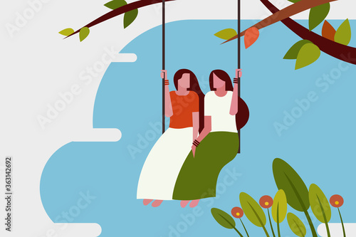 Two girls swinging in outdoor. Concept of Onam festival in Kerala, India