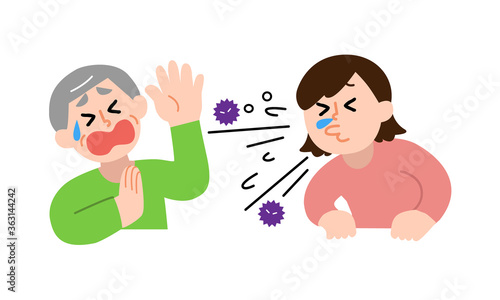 くしゃみする女性と嫌がるシニア男性
