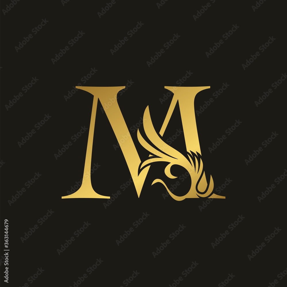 Golden Swirl Ornate Initial Letter M logo icon, vector letter with ornate swirl deco clip art design. Golden Swirl Ornate Initial Letter M logo icon, vector letter with ornate swirl deco clip art design.