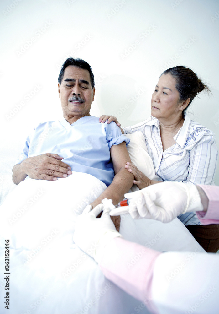 Fototapeta premium Elderly man afraid of injection