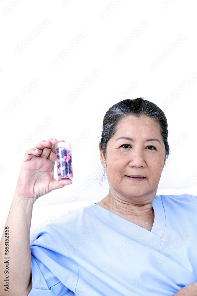 Patient holding medicine