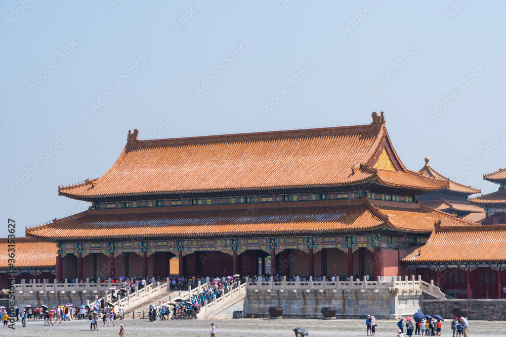 Forbidden City close to Tiananmen Square - the large square near the center of Beijing, Gate of Heavenly Peace . Eaves of traditional oriental ancient buildings. Forbidden City close to Tiananmen Square - the large square near the center of Beijing, Gate of Heavenly Peace . Eaves of traditional oriental ancient buildings.