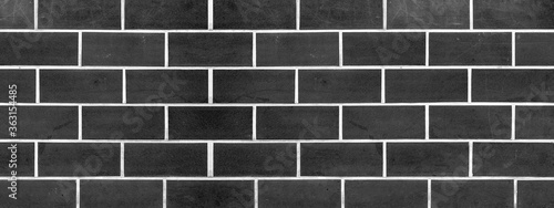 Black anthracite gray grey dark seamless brick stone tiles wall texture background banner panorama panoramic 