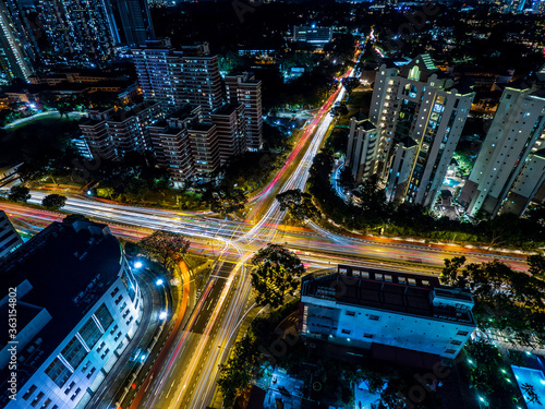 Canvas Print Car light trails at intersection in Singapore