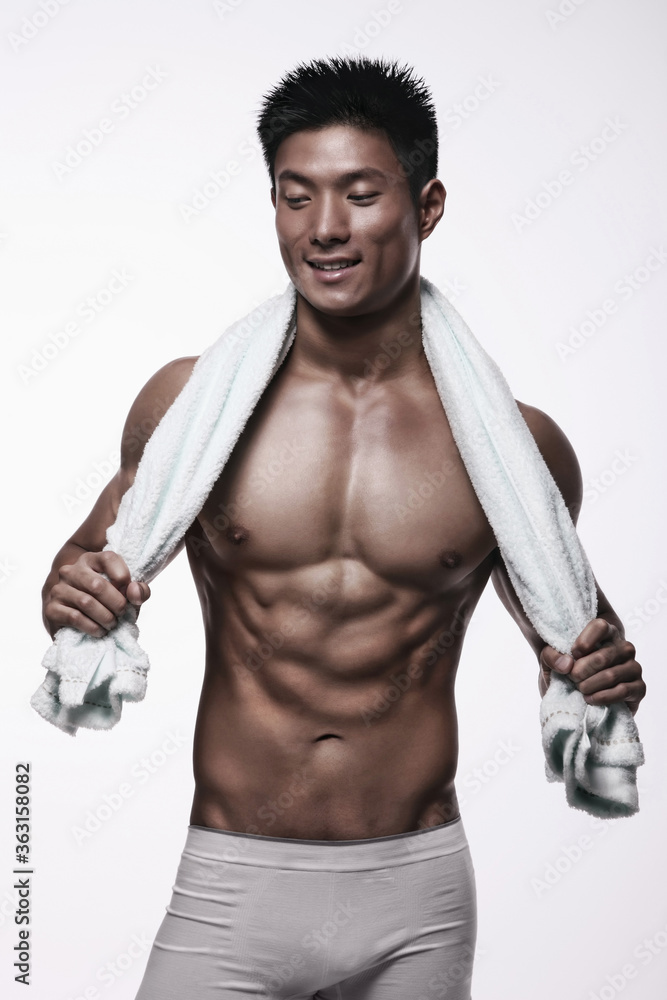 Man with towel around his neck Man with towel around his neck