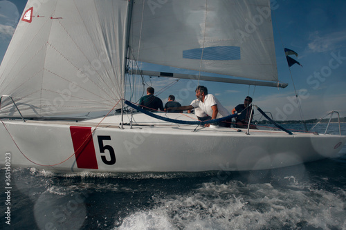 Luxury yachts at Sailing regatta. Sailing in the wind through the waves at the Sea. 