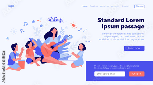 Group of kids clapping hands at their teacher playing guitar. Children enjoying music class outdoors. Can be used for daycare, education, musical school concepts