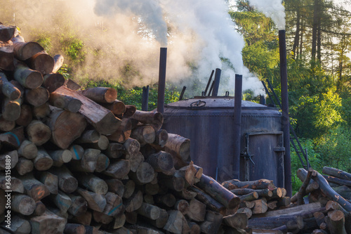 Fototapeta Naklejka Na Ścianę i Meble -  wood burning in the Bieszczady Mountains
