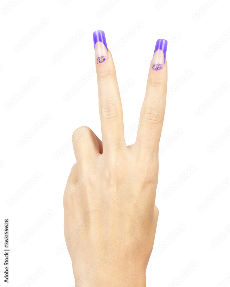 Victory sign. Hand with blue french acrylic nails manicure and painting Victory sign. Hand with blue french acrylic nails manicure and painting