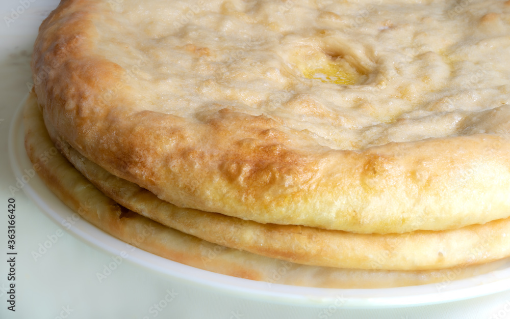 Cooked pies lie on a tray Cooked pies lie on a tray