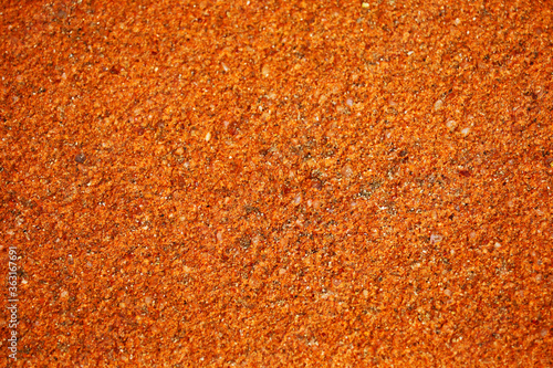 light orange and light copper color of ancient laterite wall photo
