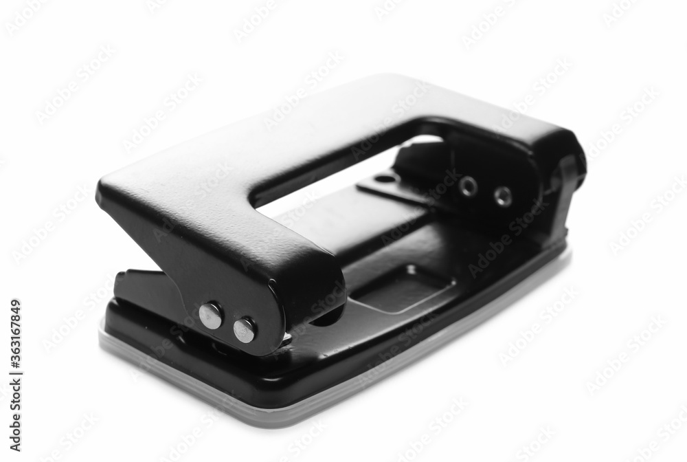 Paper puncher tool, device for office work isolated on white background Paper puncher tool, device for office work isolated on white background