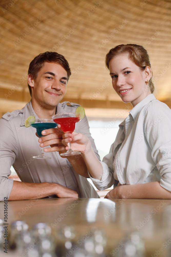 Man and woman drinking at the bar Man and woman drinking at the bar