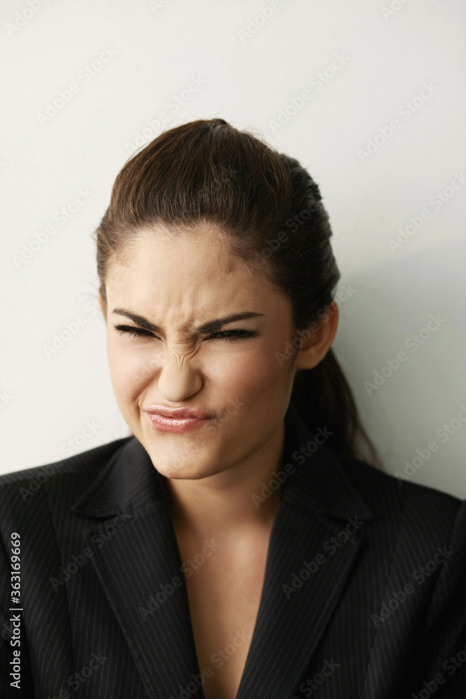 Businesswoman making a face Businesswoman making a face