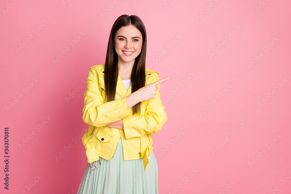 Portrait of her she nice-looking attractive lovely pretty fashionable cheerful cheery girl showing copy empty blank space place isolated over pink pastel color background Portrait of her she nice-looking attractive lovely pretty fashionable cheerful cheery girl showing copy empty blank space place isolated over pink pastel color background