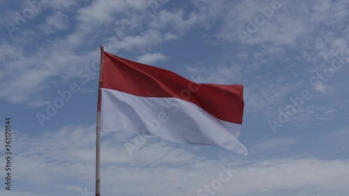 Indonesia Flag Fluttering in Sky. Indonesia Independence Day in August.