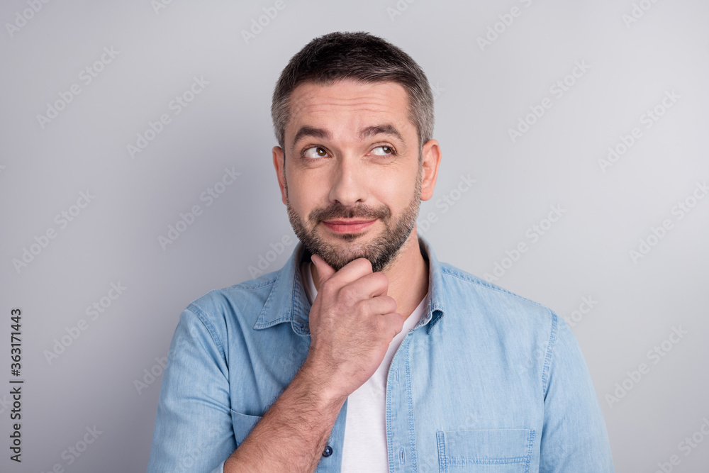 Close-up portrait of his he nice attractive creative sly cunning cheery guy worker overthinking solution decision solving isolated over gray light pastel color background