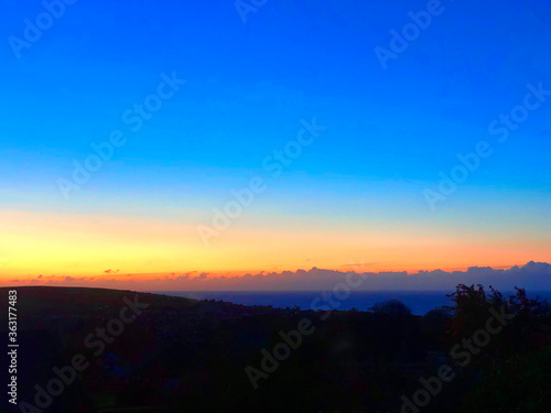 Beautiful sunrise over Onchan Isle of Man looking across the Irish Sea to the English Lake District