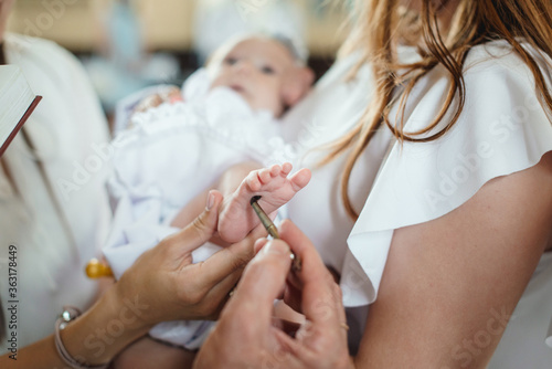 Wallpaper Mural baptism ceremony in the church. priest performing a ritual Torontodigital.ca