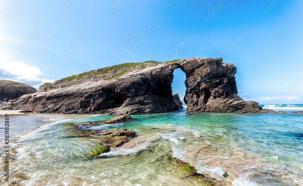 Natural arch in Cathedrals beach. Beautiful beach in Ribadeo. Tourism in Galicia. The most beautiful spots in Spain.