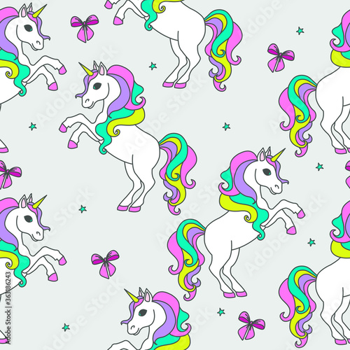 Seamless pattern with unicorns and stars and bows . Baby background.