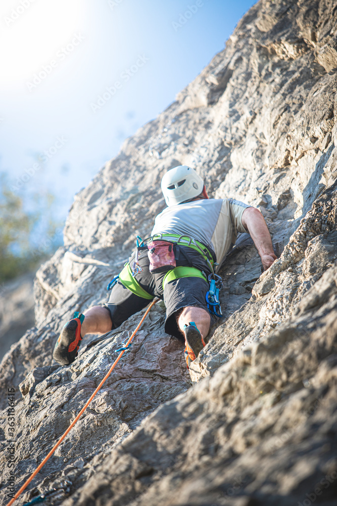 Climber training on a rock wall